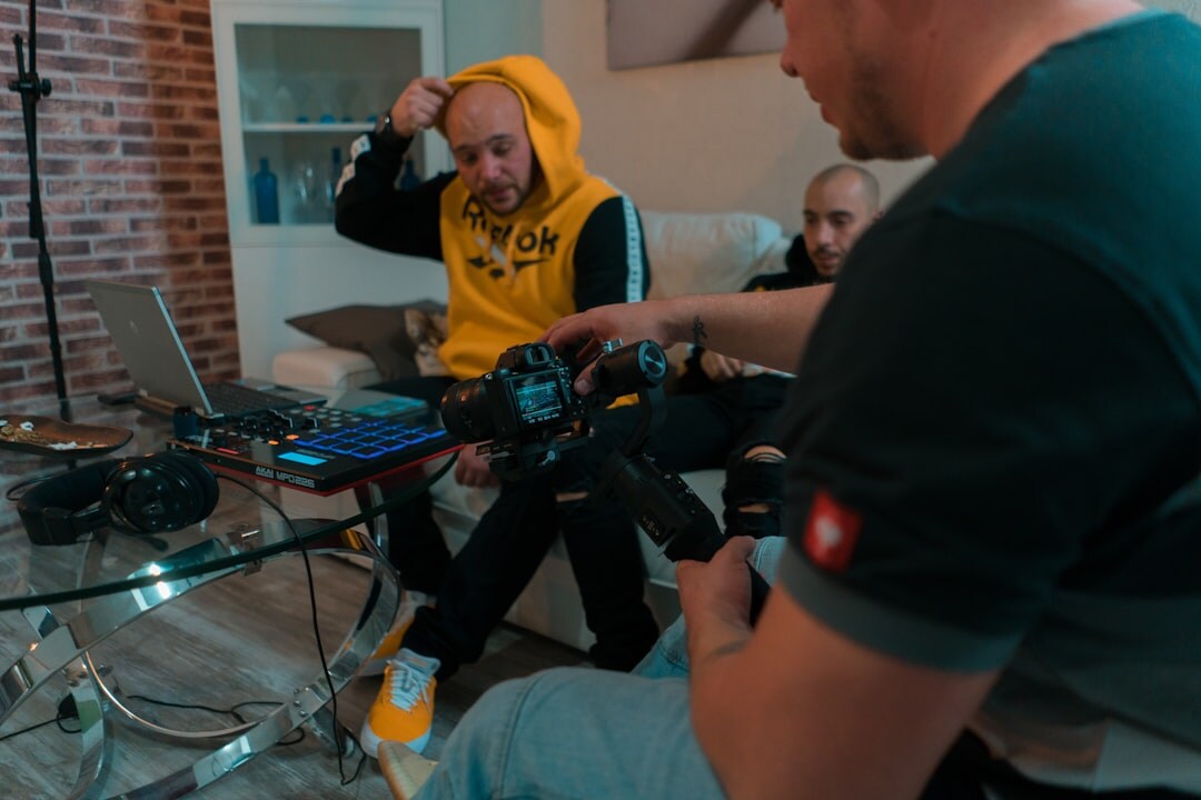 Video production crew filming in a studio
