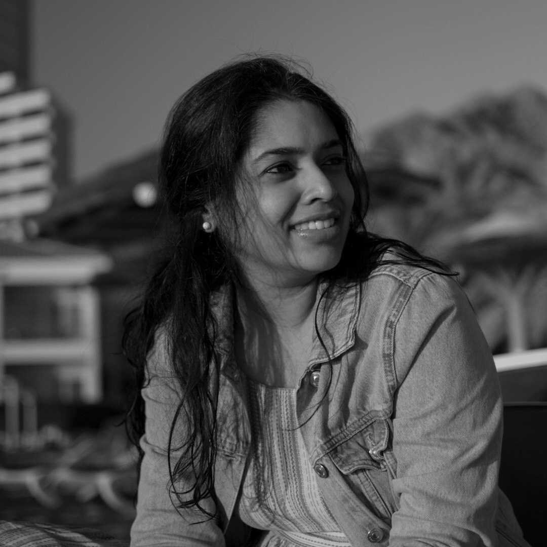 Professional woman, media producer, smiling
